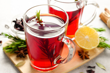 Herbal Tea, Red Tea in Glass Mugs, Autumn or Winter Drink