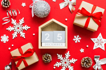 Christmas calendar 25 december. Christmas gift, fir branches, pine cones. Flat lay, top view. New...