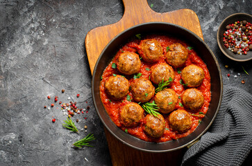 Meatballs in Tomato Sauce, Homemade Meatballs in a Pan on Dark Background