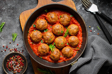 Meatballs in Tomato Sauce, Homemade Meatballs in a Pan on Dark Background