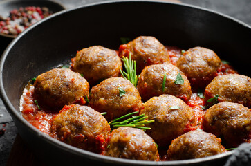 Meatballs in Tomato Sauce, Homemade Meatballs in a Pan on Dark Background