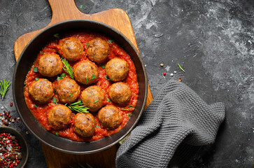 Meatballs in Tomato Sauce, Homemade Meatballs in a Pan on Dark Background