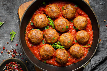 Meatballs in Tomato Sauce, Homemade Meatballs in a Pan on Dark Background