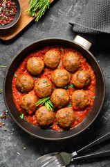 Meatballs in Tomato Sauce, Homemade Meatballs in a Pan on Dark Background