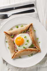 Buckwheat galettes with egg, ham, and cheese make an incredibly satisfying brunch with their savory...