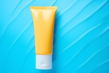 Sunscreen. Cream in tube on blue background.