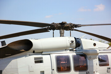 close up helicopter rotor blade  parking on run way against blue sky