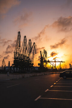 Bulgaria, Varna, Parking lot of commercial dock at sunset