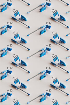 3D pattern of blue colored office supplies floating against white background