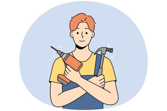 Smiling young male mechanic in uniform holding repairing tools in hands. Happy repairman or engineer with drill and hammer ready for fix. Vector illustration.