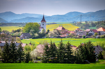 A Picturesque Spring Evening in the Village Landscape. Church in Spring