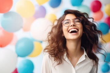 Joyful Celebration: Young woman laughing heartily with colorful balloons - AI Generated - obrazy, fototapety, plakaty
