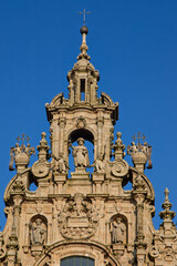 Fototapeta na wymiar Santiago de Compostela Basilica facade top details. This integral component of the World Heritage Site is reputed burial place of Saint James the Great, apostle 