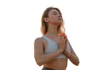 The yoga coach gains calm and awareness and good health.  A woman does yoga, training the mental and psychological state of calm.