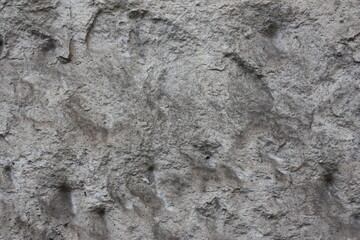 Fragment of the old facade of a house made of travertine, Hungary, Budapest