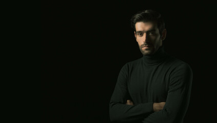 Confident Worker young man standing look at camera with crossed hands over black background Successful young guy portrait Attractive businessman look at camera with crossed arms studio shot