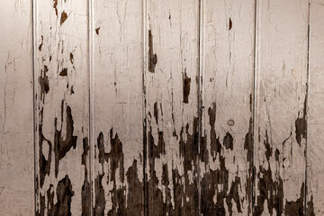 wooden wall with peeling paint