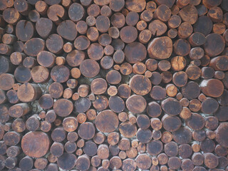 stacked wooden cut logs texture background. - 666486089