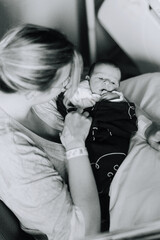 A mother with her newborn in the hospital