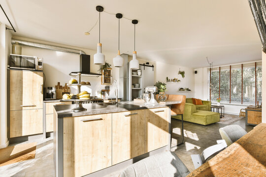 Pendant lights hanging over island in kitchen