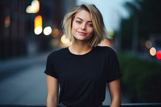 Portrait of beautiful blond woman wearing black t-shirt. Street photo