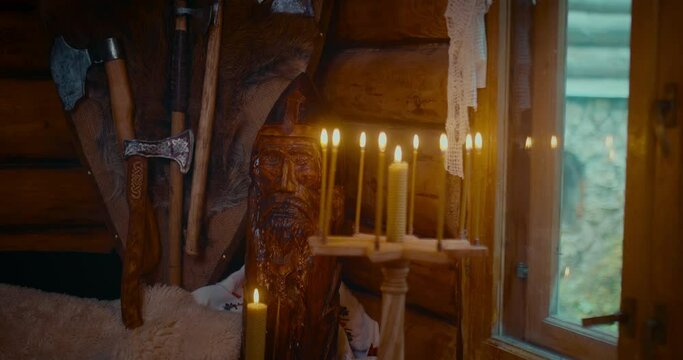 wooden idol in ancient house of Slavic or Vikings village, ancient culture and history, 4K, Prores