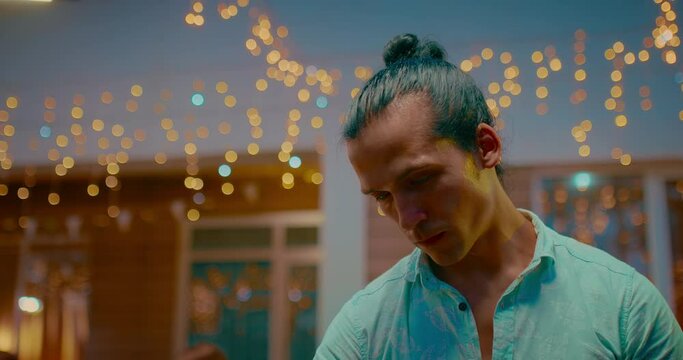 Portrait of mixed race man cooking at BBQ party in backyard, Native American ethnicity, 4K, Prores
