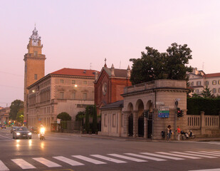 Fototapeta na wymiar Bergamo street scene showing the Torre dei Caduti at dusk