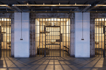 Interior of the industrial prison hallway with rows of cells. Focused on an cell
