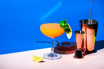 Paddington cocktail drink with rum, yellow liquor, grapefruit and lemon juice, marmalade and...