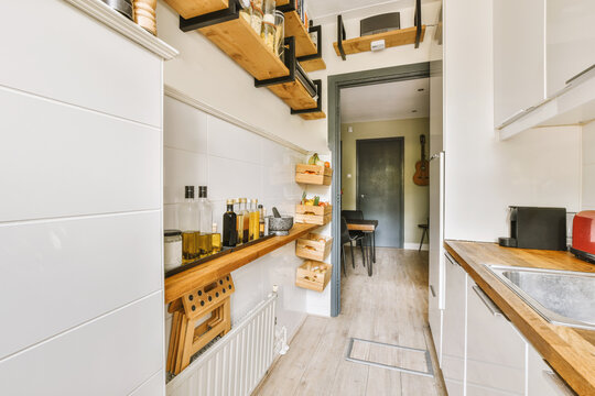 Kitchen with wooden shelves and baskets