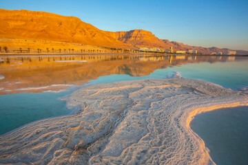 Fototapeta na wymiar Dead Sea, Israel, salty coast, Hotels and Spa centers in Ein Bokek area. Climatotherapy on Psoriasis 