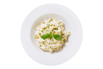 plate of pasta fettuccine alfredo isolated on transparent background, top view