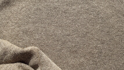 Fototapeta na wymiar Viscose knitted beige fabric with lurex. Texture of knitwear. Golden fabric. Viscose. Knitting, knitwear.