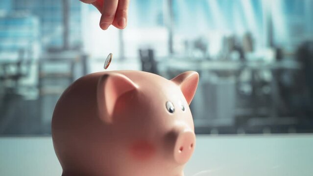 Aesthetic Super Slow Motion Close Up Footage of a Person Dropping a Coin Into a Pink Ceramic Piggy Bank. Concept of Business, Finance, Banking, Economy and Money Saving
