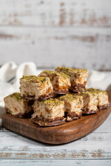 Pistachio and chocolate chip cookies. Fresh pistachio cookies on wooden background