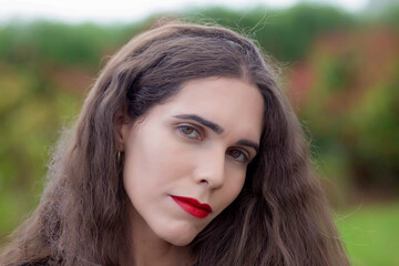 Fototapeta premium Portrait of transgender woman looking at camera