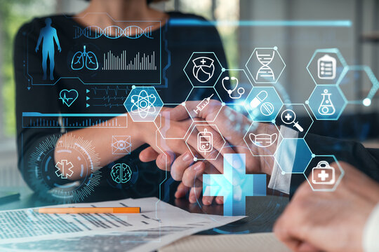 Businesspeople shake hands on great deal at office workplace. Concept of team work, business agreement, partnership, project success. Handshake shot. Medical icons.