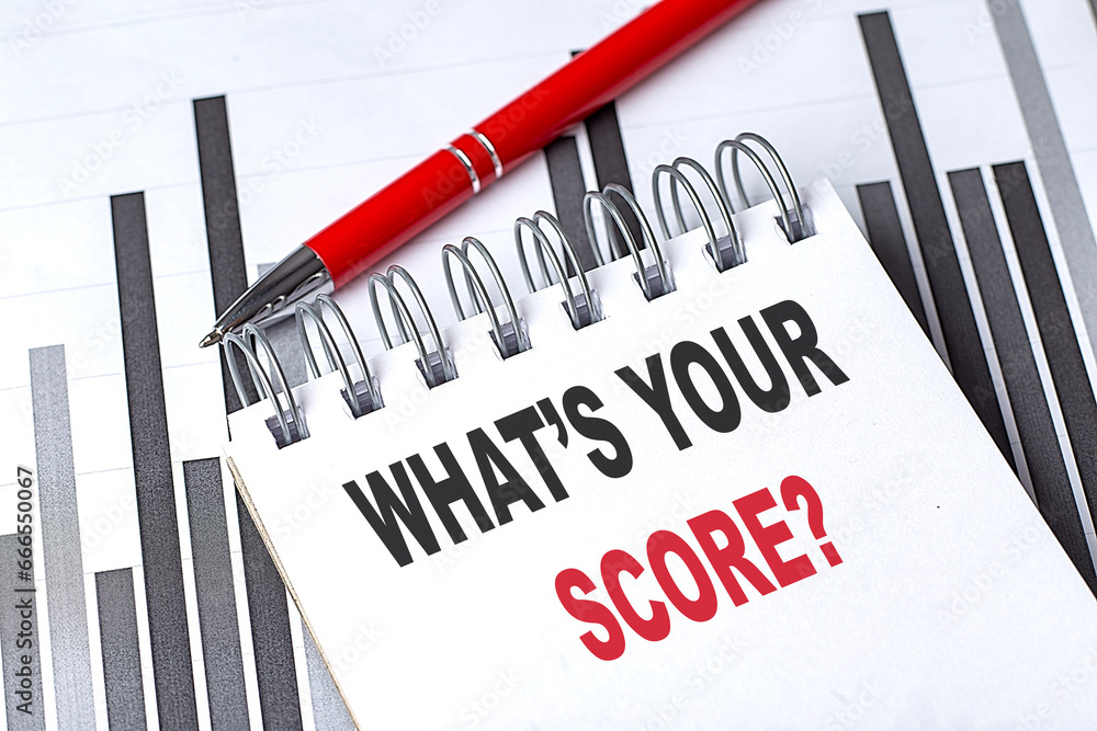Poster what's your score text written on notebook with pen on chart