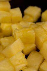 sliced ripe yellow pineapple, a large number of pieces