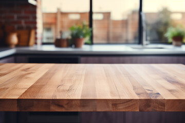 Fototapeta premium Top of surface wooden table with blurred modern kitchen background.