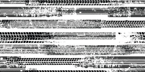 Tire track seamless pattern. Grange tread marks .Grunge textured vector car tread . Car trails endless pattern texture. Tyre track seamless texture. Wheel tire tread track background © miloje