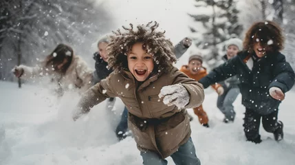 Foto op Plexiglas Children in snowball fight, embodying the winter vibe. They are actively playing outdoors on a snowy day. Their healthy faces lit up with joy and excitement. Beautiful and crisp winter day. © TensorSpark