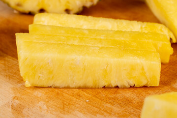 ripe yellow pineapple cut into pieces