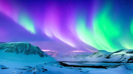 Fototapeta premium Panorama of the northern lights over snowcapped mountains