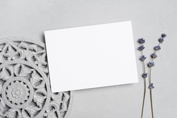 Wedding invitation card mockup with lavender flowers, blank paper card with copy space