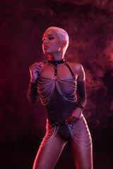 Hot dancer woman. Portrait of sexy TDJ girl at the night club party. Mixtape or book covers - download high resolution picture for your song or music clip.