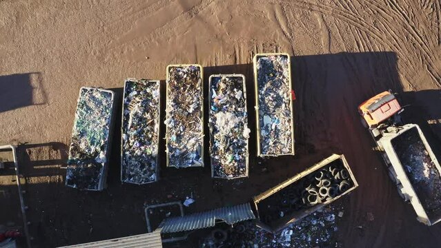Garbage collecting containers and sorting site. Aerial view of garbage dump site