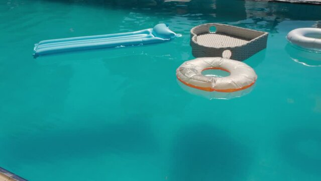 things floating on the pool on a sunny day