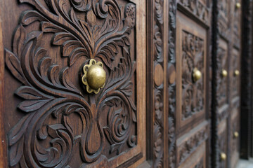 traditional swahili doors made of wood and brass as found in Tanzania and Zanzibar
 - obrazy, fototapety, plakaty